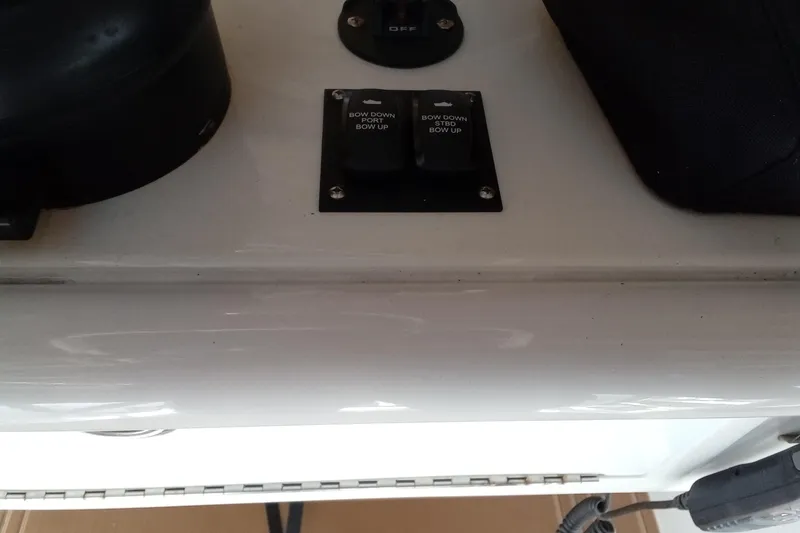 Slide: The Image of Control panel of 2022 Invincible 39 Open Fisherman boat with switches. - 43