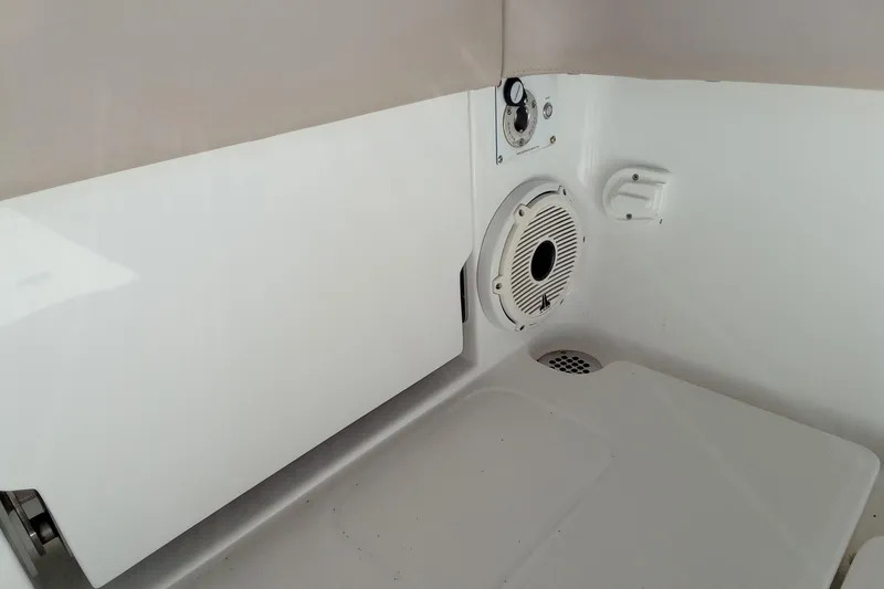 Slide: The Image of 2022 Invincible 39 Open Fisherman interior detail with speaker and control panel. - 6