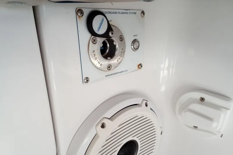 Slide: The Image of 2022 Invincible 39 Open Fisherman outboard flushing system and speaker detail. - 7
