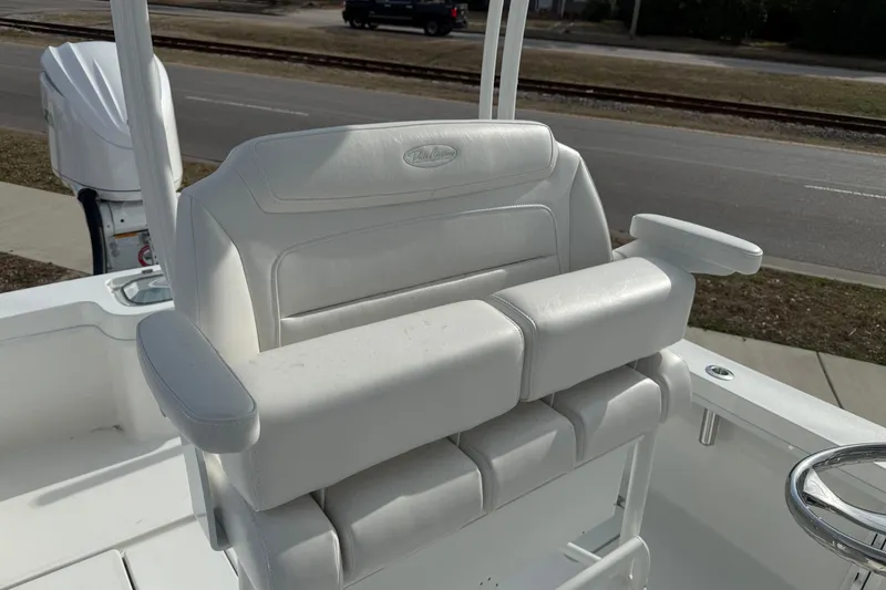 Slide: The Image of 2026 Pair Customs 24 Center Console MV boat with white cushioned seating. - 4