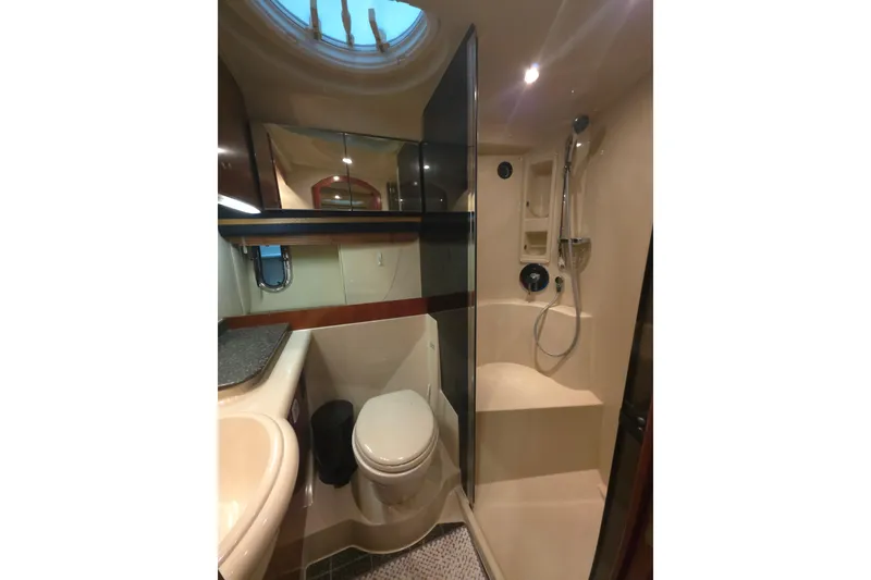 Slide: The Image of Luxurious bathroom in 2008 Cruisers Yachts 390 Sports Coupe with shower and toilet. - 25