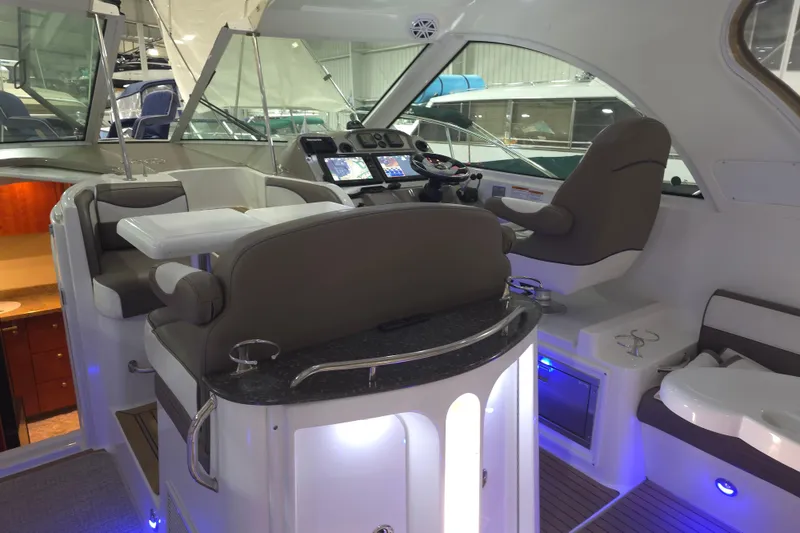 Slide: The Image of 2008 Cruisers Yachts 390 Sports Coupe interior with modern helm and seating area. - 40