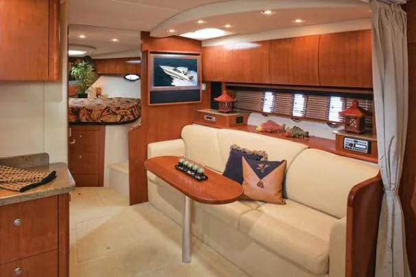 Slide: The Image of 2008 Cruisers Yachts 390 Sports Coupe interior with helm and seating area. - 5