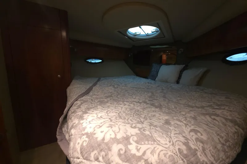 Slide: The Image of Luxurious cabin interior of 2008 Cruisers Yachts 390 Sports Coupe with elegant bedding. - 20