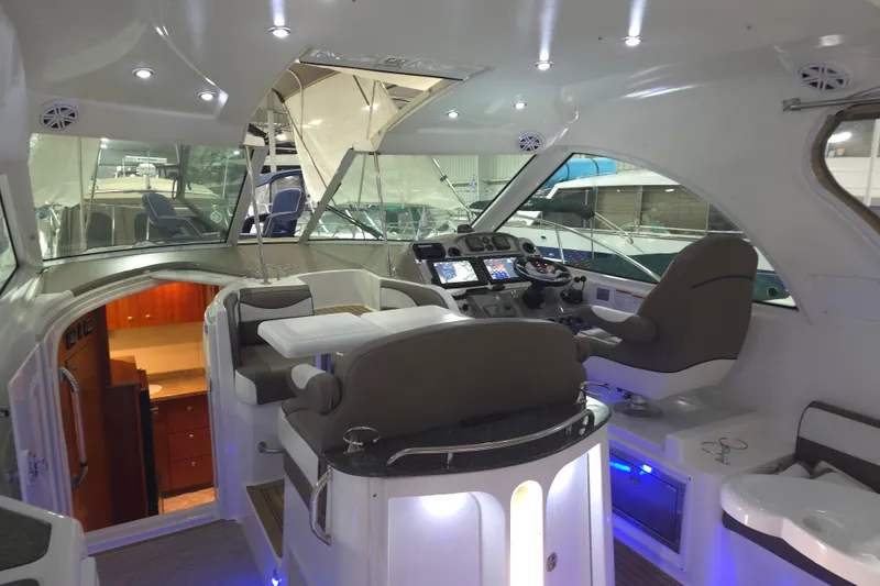 Slide: The Image of Luxurious interior of 2008 Cruisers Yachts 390 Sports Coupe with modern helm and seating. - 37