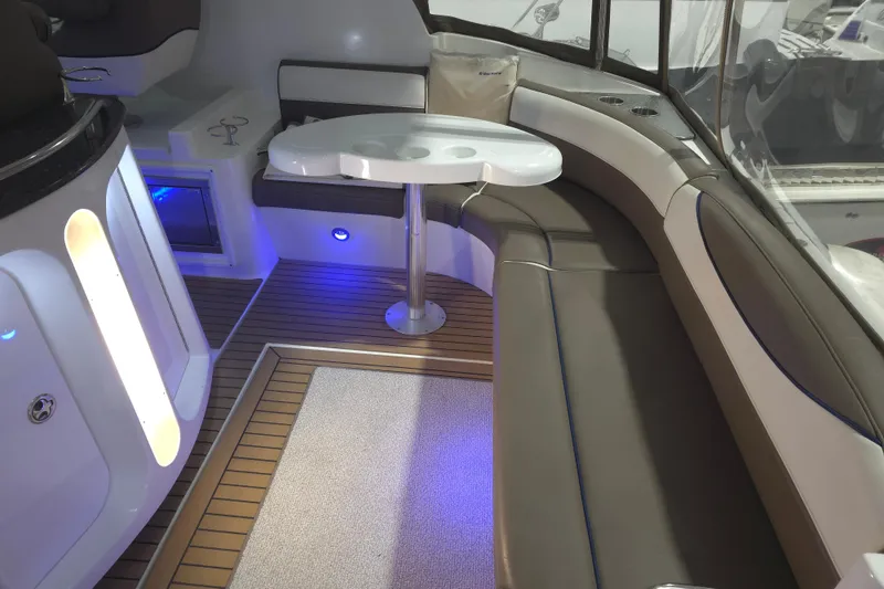Slide: The Image of 2008 Cruisers Yachts 390 Sports Coupe interior with seating and table, featuring modern design. - 39