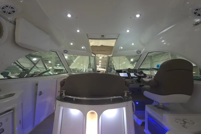Slide: The Image of Interior view of 2008 Cruisers Yachts 390 Sports Coupe cockpit with modern controls. - 43