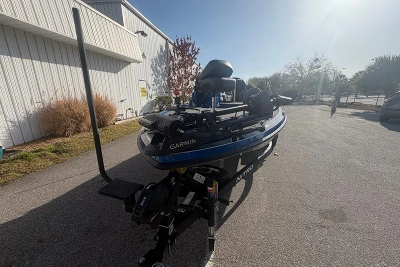 The Image of 2026 Nitro Z19 XL Pro boat with Garmin equipment, parked outdoors in sunlight. - 0