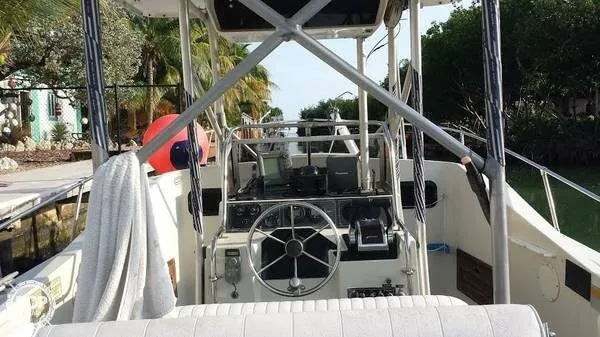 Slide: The Image of Boston Whaler 27 Center Console Cuddy 1986 - 2