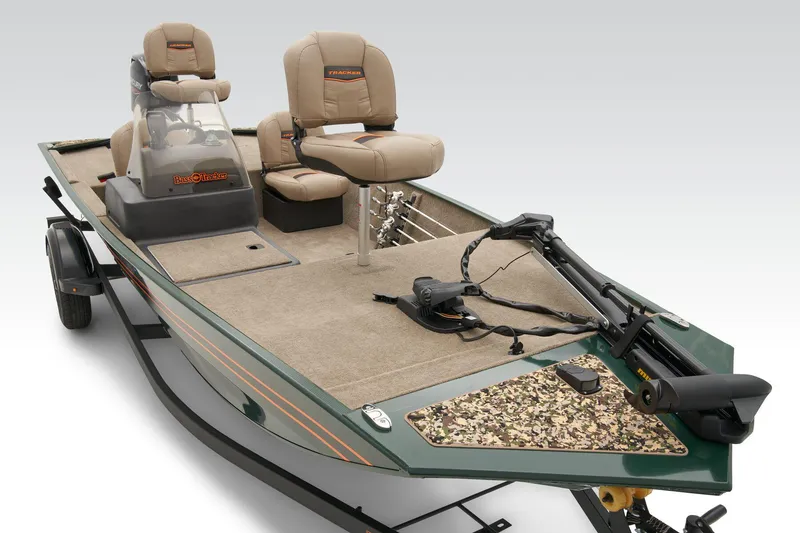 Slide: The Image of 2026 Tracker Bass Tracker Classic Limited dashboard with steering wheel and fishfinder display. - 7