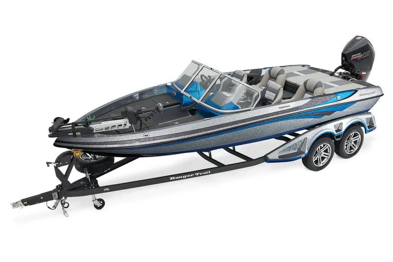 Slide: The Image of 2026 Ranger 212LS boat on trailer with Minn Kota motor, parked outdoors. - 3