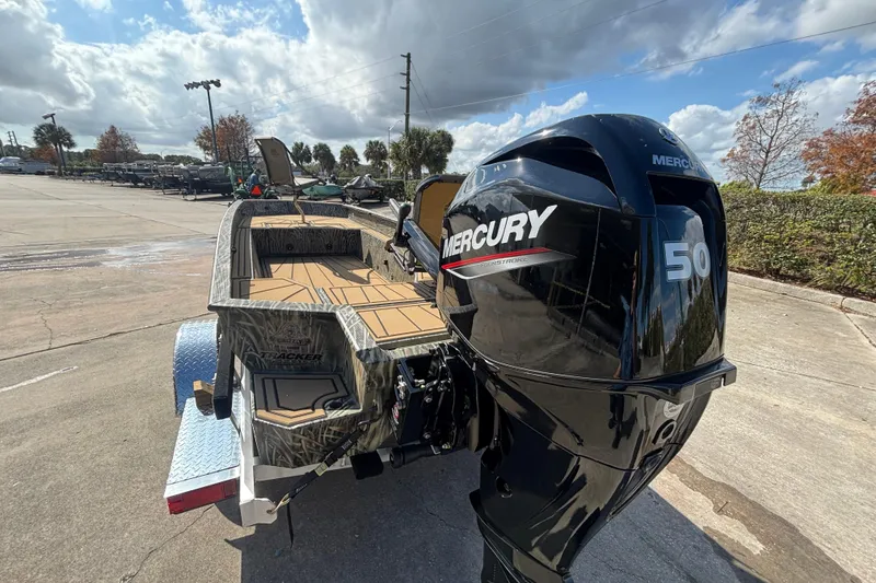 Slide: The Image of 2026 Tracker Grizzly 1650 T Prairie Wings Edition boat with Mercury 50 outboard motor. - 34