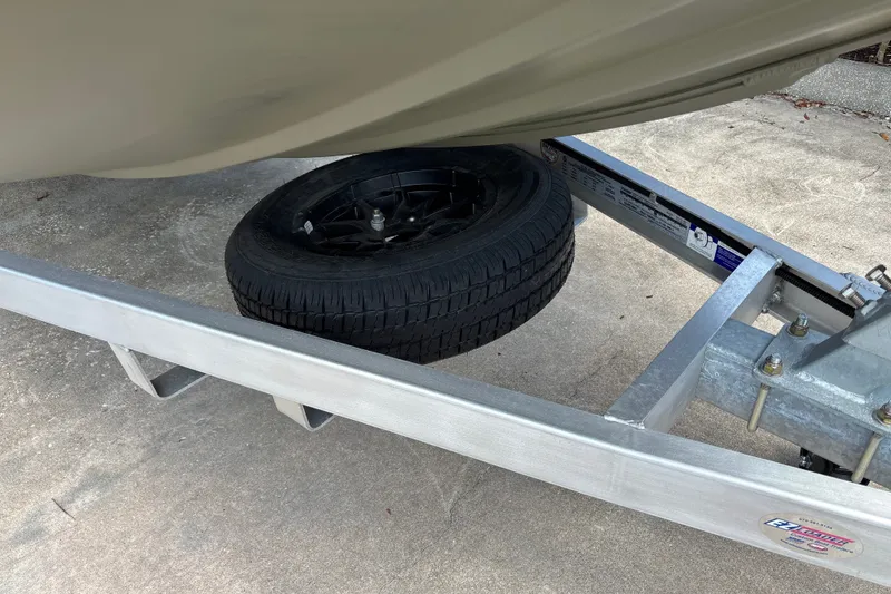 Slide: The Image of Trailer wheel under Tracker Grizzly 1650 T Prairie Wings Edition boat, 2026 model. - 19
