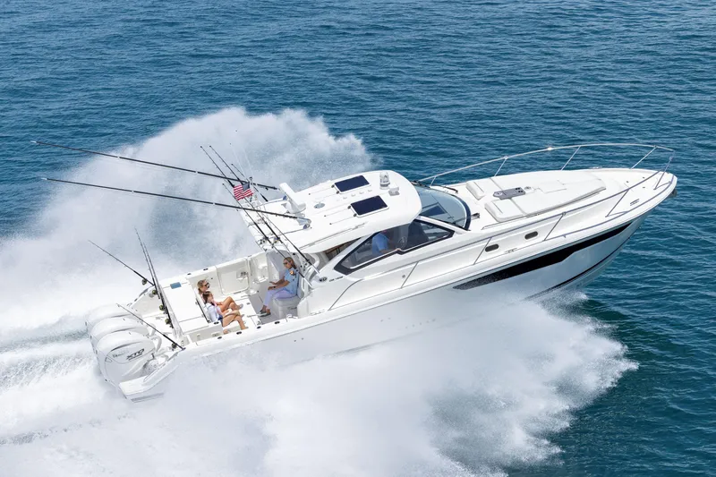 The Image of 2026 Pursuit OS 405 Offshore boat cruising on open water, showcasing sleek design and powerful engines. - 0