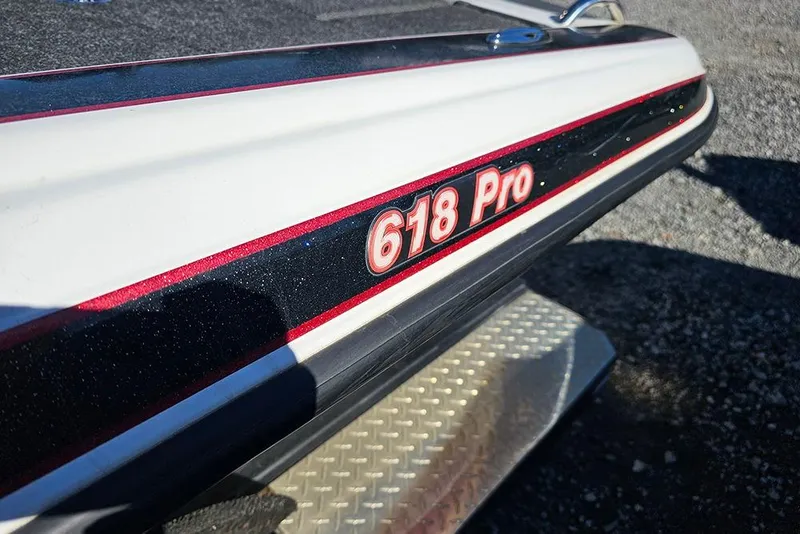 Slide: The Image of Close-up of 2011 Phoenix 618 Pro boat with red and black detailing. - 16