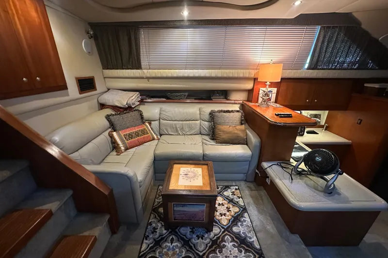 Slide: The Image of Luxurious 2005 Cruisers Yachts 375 Motoryacht interior with cozy seating and elegant decor. - 4