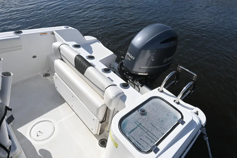 Slide: The Image of 2020 Wellcraft 222 Fisherman boat with Yamaha engine on calm water. - 17