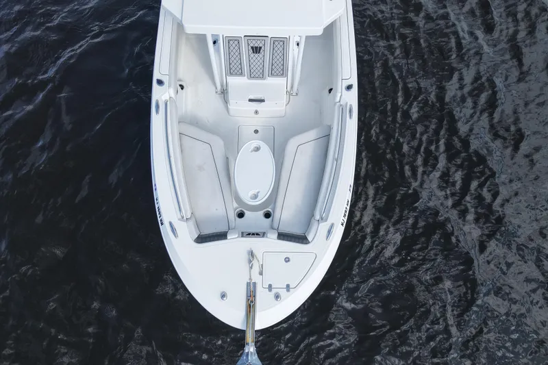 Slide: The Image of Overhead view of 2020 Wellcraft 222 Fisherman boat on water. - 7