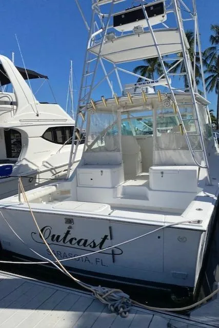 Slide: The Image of 2000 Cabo 35 Express boat docked in Sarasota, FL. - 3