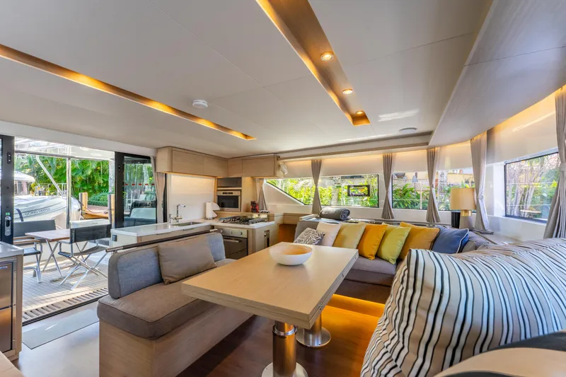Slide: The Image of Luxurious interior of 2024 Lagoon 51 yacht with modern kitchen and cozy seating area. - 34