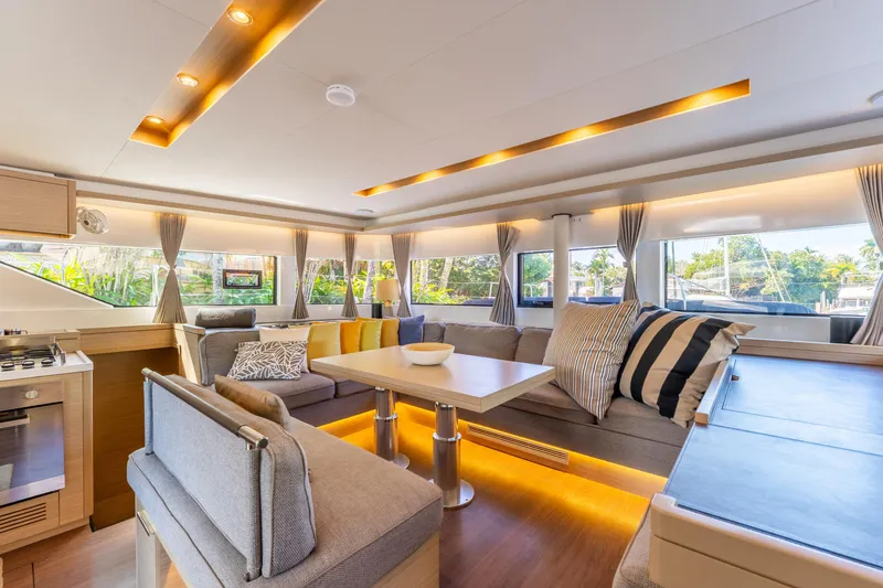 Slide: The Image of Luxurious interior of 2024 Lagoon 51 yacht with modern seating and ambient lighting. - 35