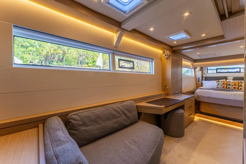 Slide: The Image of Luxurious interior of 2024 Lagoon 51 yacht with modern design and natural light. - 50