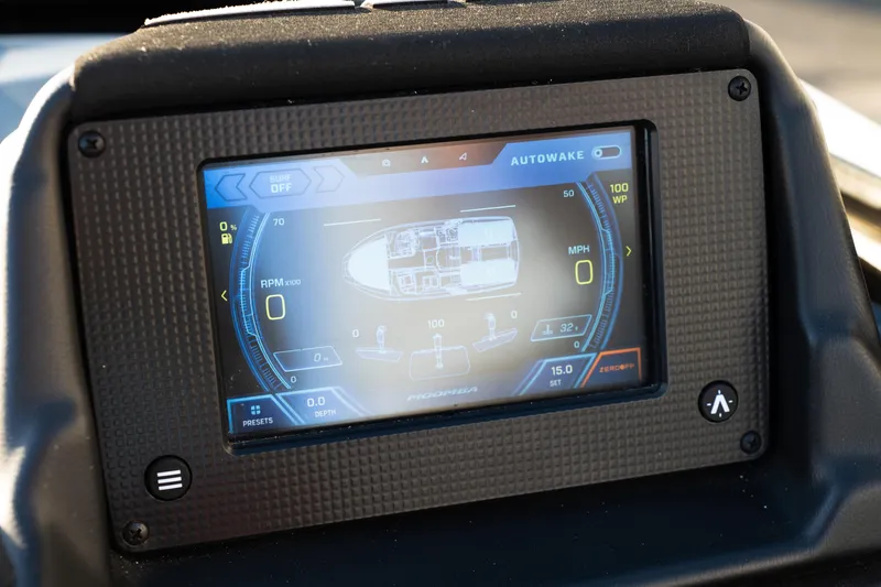 Slide: The Image of 2021 Moomba Mondo dashboard display showing Autowake and boat controls. - 13