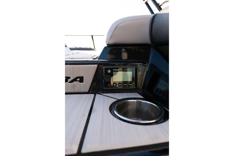 Slide: The Image of 2021 Moomba Mondo boat interior with Fusion stereo and cup holder. - 15