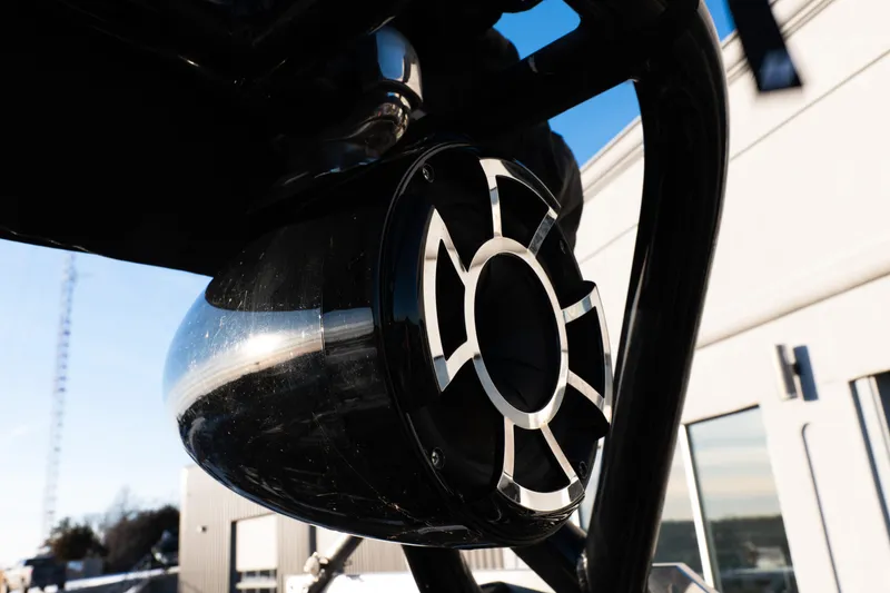 Slide: The Image of 2021 Moomba Mondo boat speaker detail with modern design against a clear sky. - 20