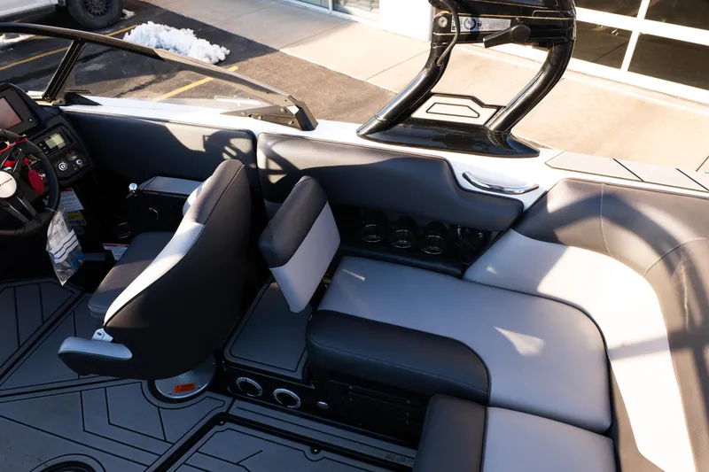 Slide: The Image of 2021 Moomba Mondo boat interior with sleek seating and modern dashboard design. - 21