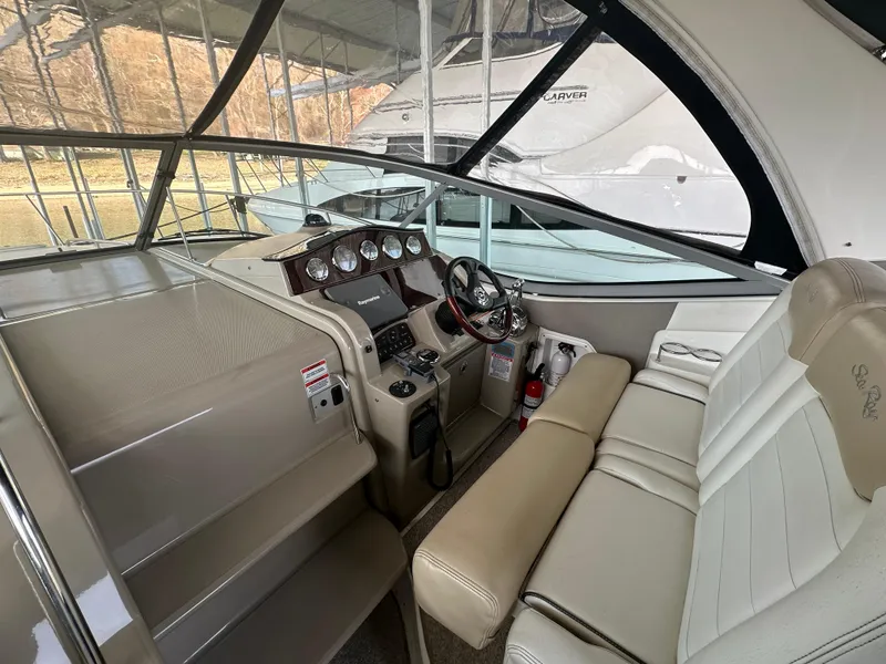 Slide: The Image of Interior of a 2008 Sea Ray Sundancer 310 yacht with helm station. - 13