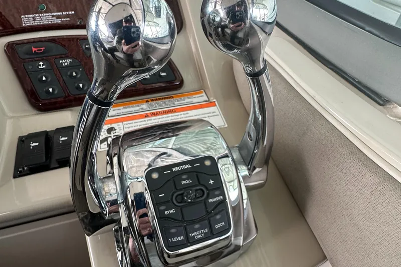 Slide: The Image of Throttle controls of 2008 Sea Ray Sundancer 310. - 15