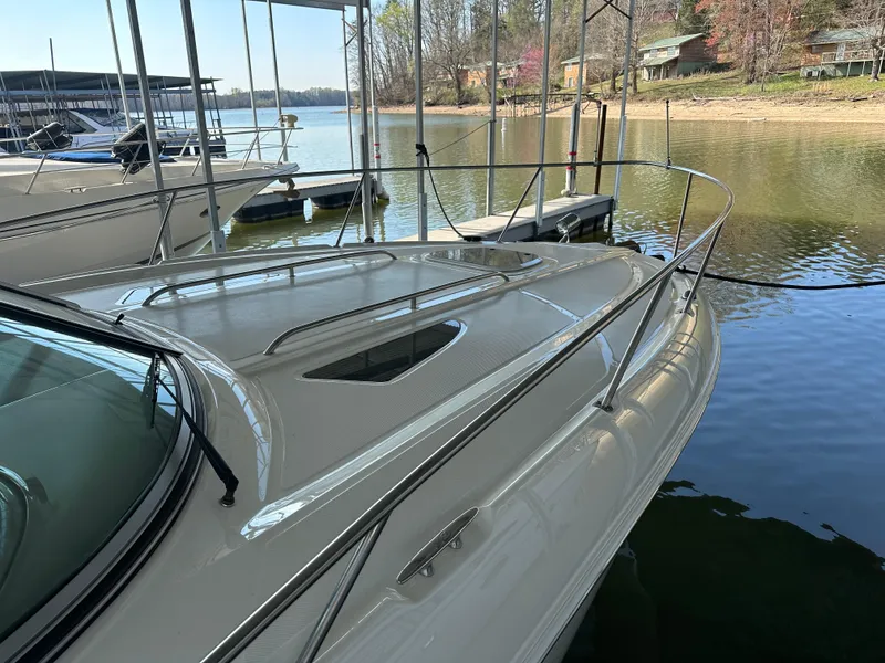 Slide: The Image of 2008 Sea Ray Sundancer 310 docked by the lakeside. - 17