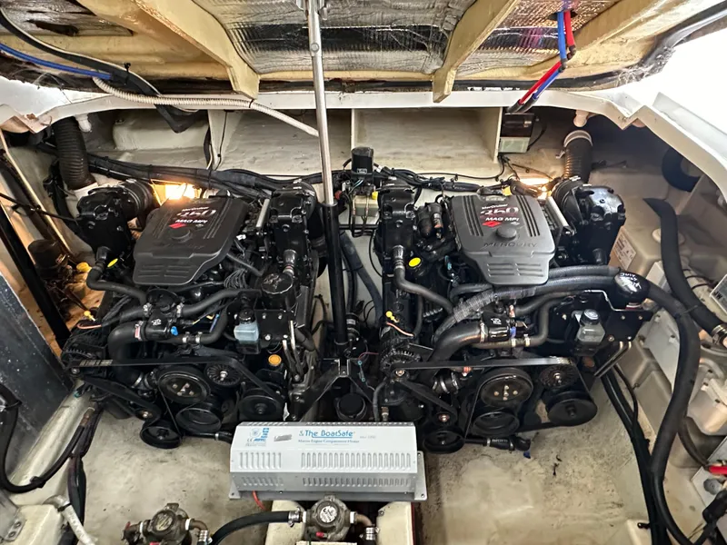 Slide: The Image of Engine room of a 2008 Sea Ray Sundancer 310 boat with dual engines. - 21