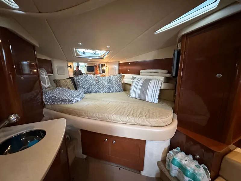Slide: The Image of Interior of a 2008 Sea Ray Sundancer 310 with cozy bed. - 5