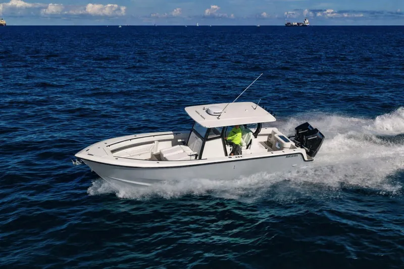 The Image of Reef Runner 340 boat 2026 cruising on open sea. - 0