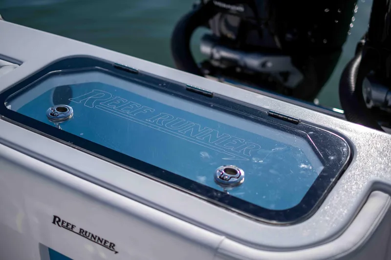 Slide: The Image of Reef Runner 340 boat, deck detail, model year 2026. - 7