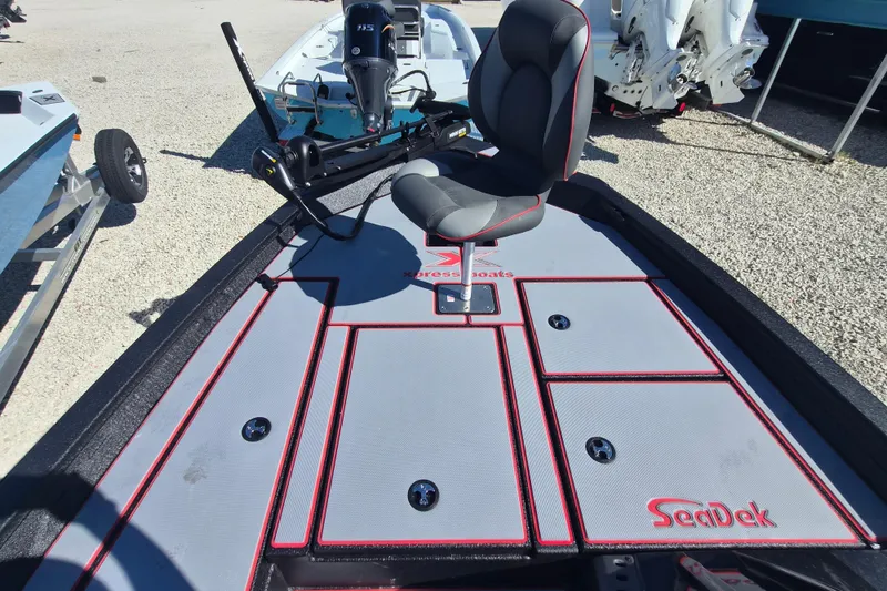 Slide: The Image of 2026 Xpress H20B Bay boat deck with SeaDek flooring and comfortable seating. - 11