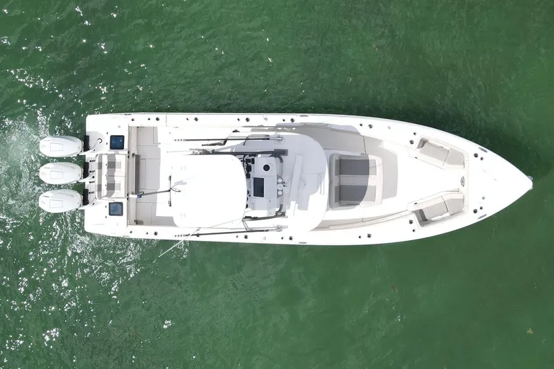 Slide: The Image of Manufacturer Provided Image: Aerial view of 2026 Solace 37 PILOT boat on green water. - 3