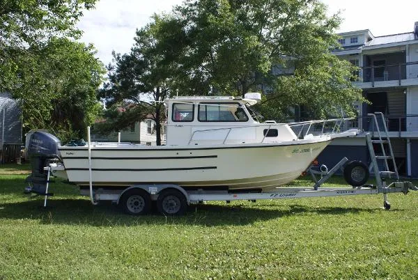 Slide: The Image of Parker Marine 23 Sport Cabin 1994 - 1