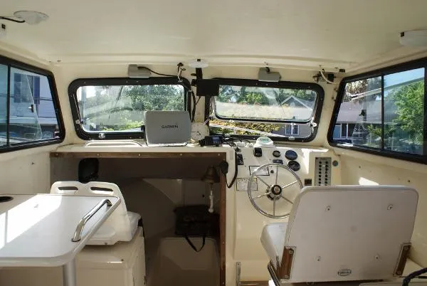 Slide: The Image of Parker Marine 23 Sport Cabin 1994 - 5