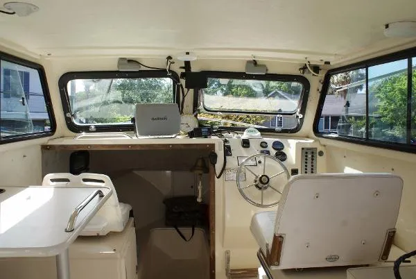 Slide: The Image of Parker Marine 23 Sport Cabin 1994 - 8