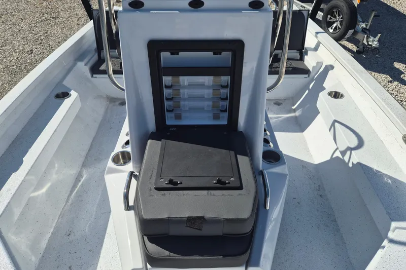 Slide: The Image of 2026 Xpress H20B Bay boat interior with storage compartments and seating. - 8