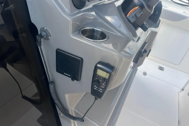 Slide: The Image of 2019 Pursuit S 368 Sport boat console with Garmin radio and controls. - 20