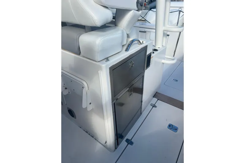 Slide: The Image of 2019 Pursuit S 368 Sport boat interior with seating and storage compartments. - 44