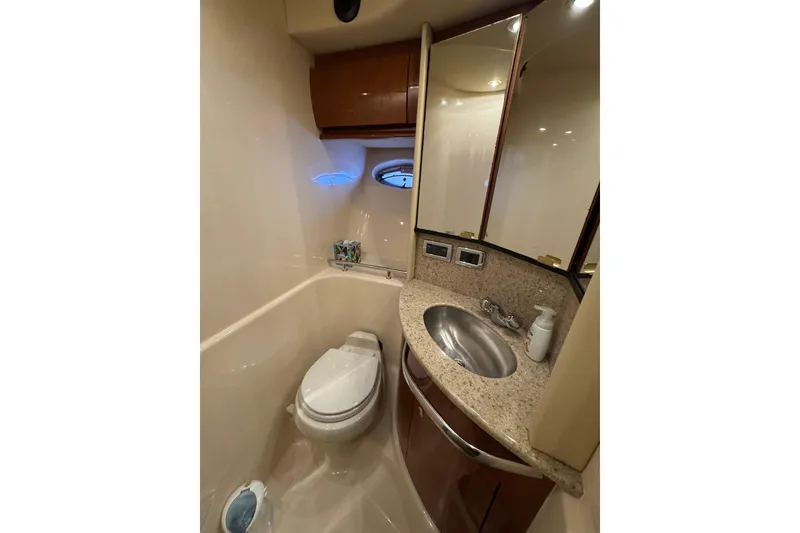 Slide: The Image of Luxurious bathroom in 2003 Sea Ray 420 Sundancer yacht with modern fixtures. - 7