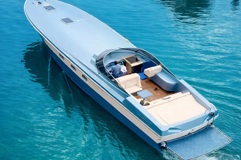 The Image of Luxury Magnum 56 yacht from 1997 cruising on clear blue water. - 0