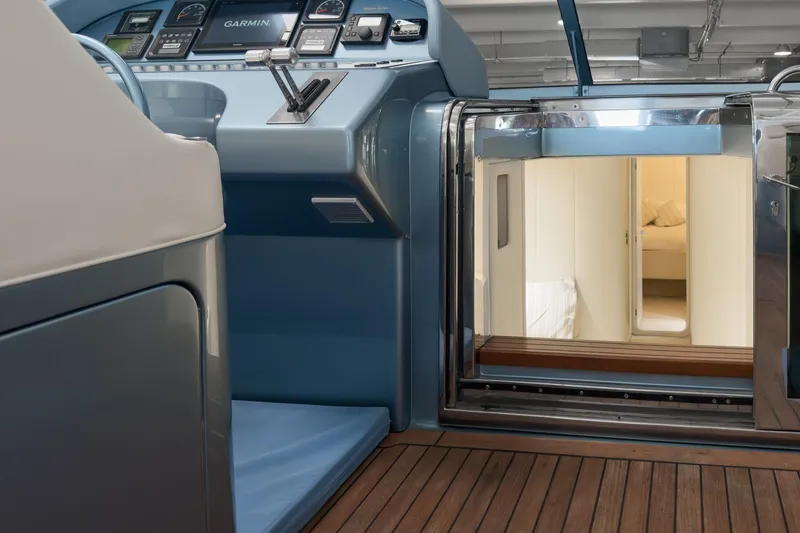 Slide: The Image of Luxury yacht interior with control panel and cabin entrance, Magnum 56, 1997 model. - 55