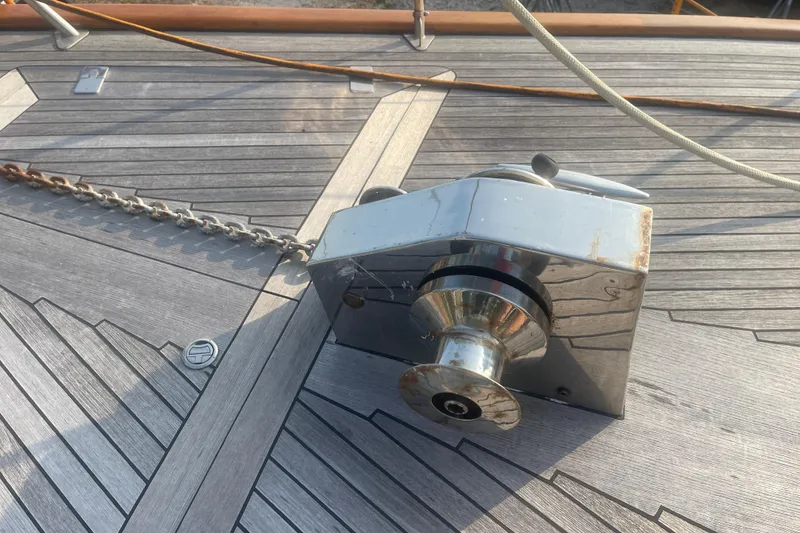 Slide: The Image of Deck of 1972 Rhodes 53 Motorsailor with anchor windlass and chain. - 21