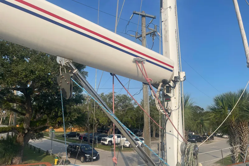 Slide: The Image of Mast and rigging of 1972 Rhodes 53 Motorsailor against a clear blue sky. - 23